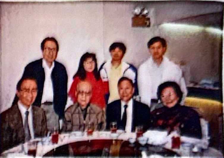 Reunion dinner with his friends in Hong Kong in 1988